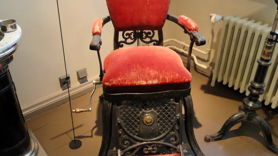 A dental office waiting area with chairs
